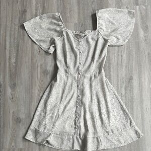 Sienna Sky Black and White Polka Dot Short Sleeve Mini Dress